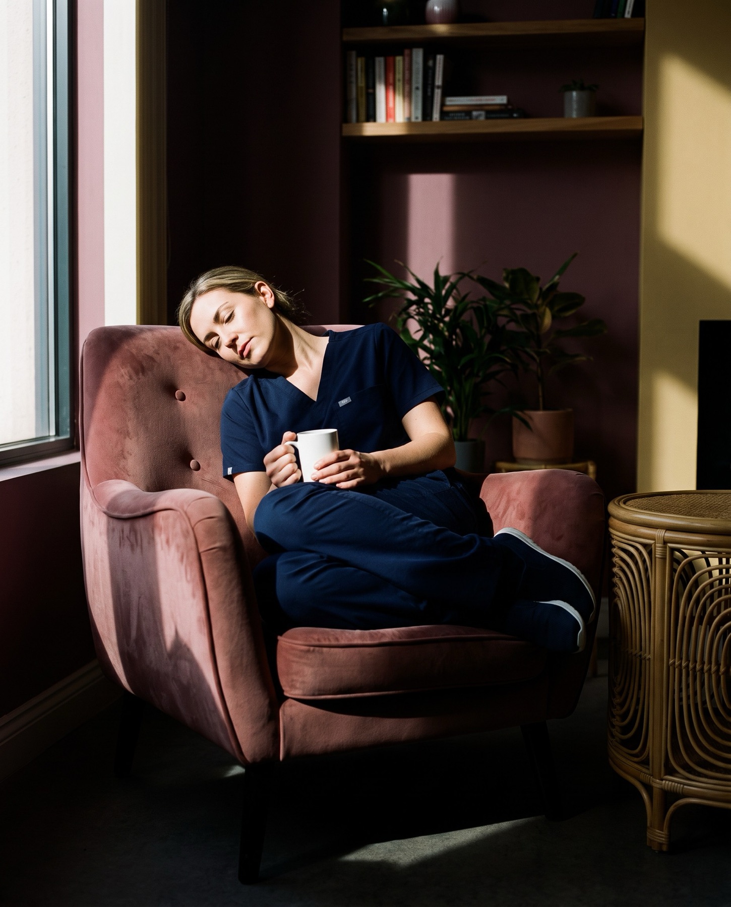A nurse resting with a cup of tea in the Off Hours lounge